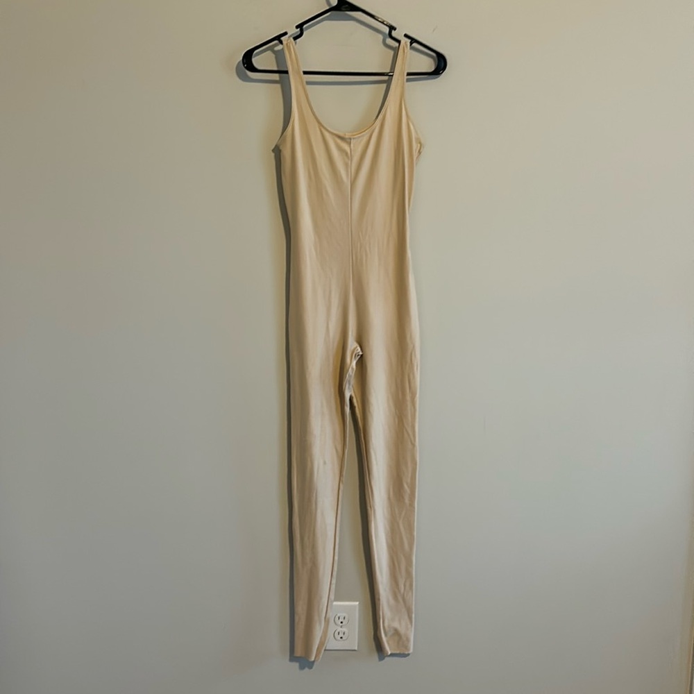 Danskin nude colored body suit small.
